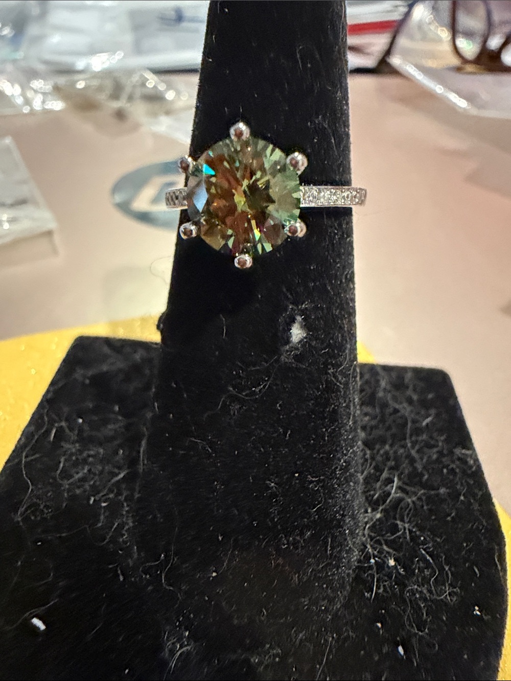 Green Round-Cut Solitaire Ring with Pavé Silver Band